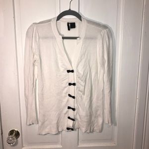White cardigan w black bows